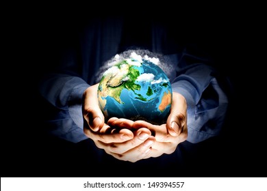 Let's save our planet earth. Ecology concept. Elements of this image are furnished by NASA - Shutterstock ID 149394557