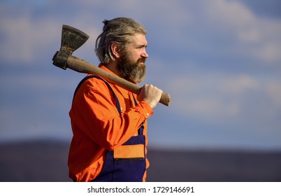 lets start working. Skilled architect repair and fix. engineer career. bearded man in uniform. mature man builder use axe. professional repairman working with ax tool. build and construction.