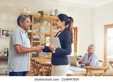 Lets Talk About Creating A Safe Retirement For You. Shot Of A Mature Couple Meeting With Their Financial Consultant At Home.