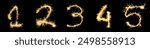 Letter "12345" made of sparklers isolated background.