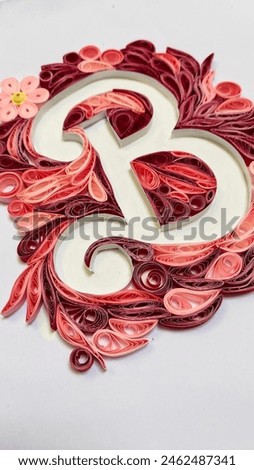 Letter B for Barbie in pink and red quilling art