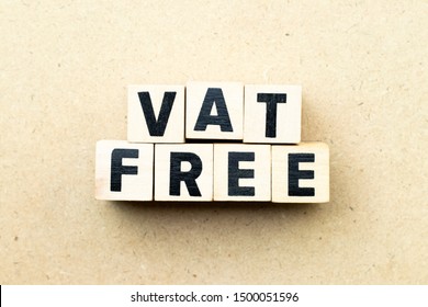 Letter block in word vat (value added tax) free on wood background
