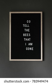letter board with old proverb about bees