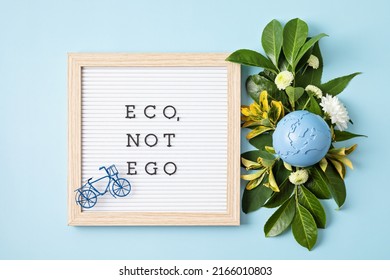 Letter board with text eco, not ego. Save the planet idea. International Mother Earth Day. Environmental problems and protection. Caring for Nature