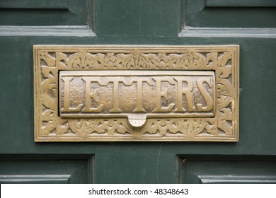 Letter Box On Green Front Door