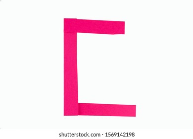 Letter C from parts of red paper.