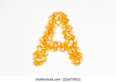 Letter A of the English alphabet from dry popcorn seeds on white background. - Shutterstock ID 2216770511
