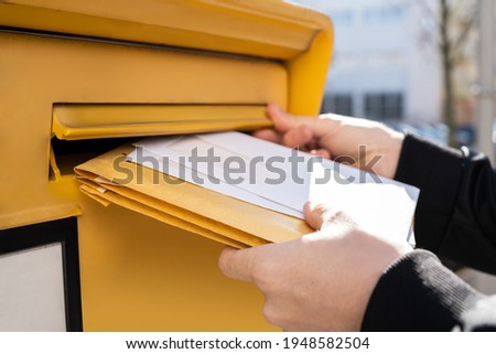 Letter In Envelope Or Document In Mailbox. Man Hand Sending Mail