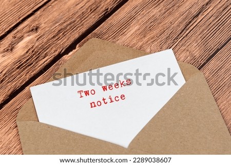 Letter in an envelope with text Two weeks notice