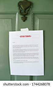 Letter Of Eviction Posted On A House Door - Landlord Notice - Courts - Hardship