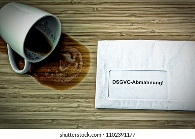 Letter with in german Achtung DSGVO-Abmahnung (Datenschutzgrundverordnung) in english attention DSGVO (GDPR) warning