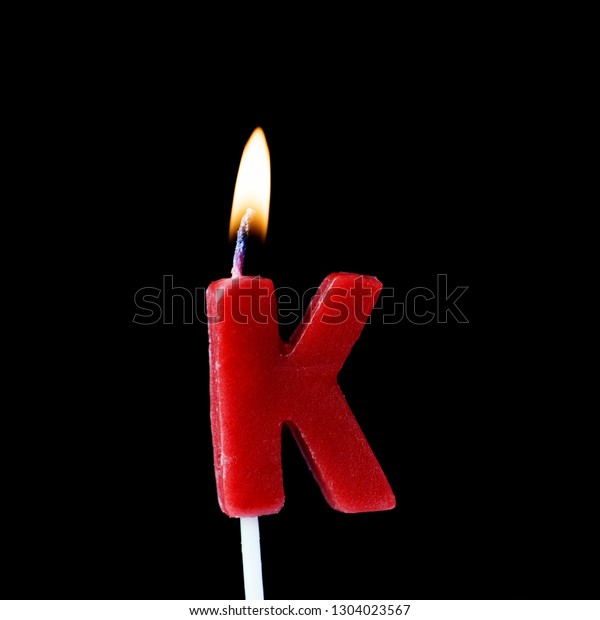 Letter K Celebration Birthday Candle Against Stock Photo (Edit Now