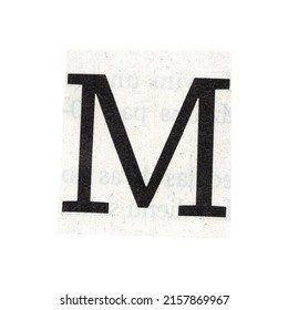 letter m magazine cut out font, ransom letter, isolated collage elements for text alphabet. hand made and cut, high quality scan. halftone pattern and texture detail. newspaper and scraps