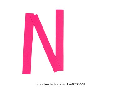 Letter N from parts of red paper.