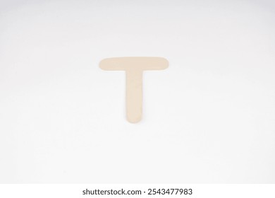 Letter T in paper on white background - Powered by Shutterstock