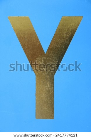 Letter Y uppercase - golden color font on blue background