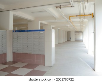 Letterbox area for mail collection in a HDB block in Singapore's public housing estate - Shutterstock ID 2001780722