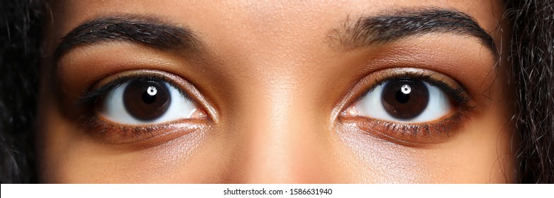 Letterbox view of black woman eyes close-up