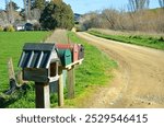 Letterboxes beside a dirt farm road, North Canterbury New Zealand. 