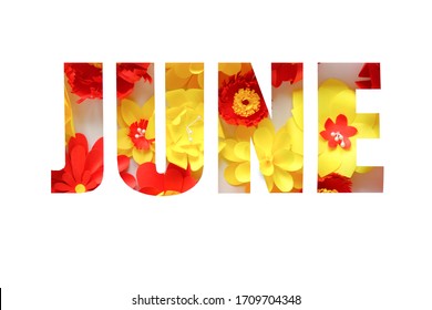 The lettering june, made of paper flowers. Hello, june. Concept of flowering, summer