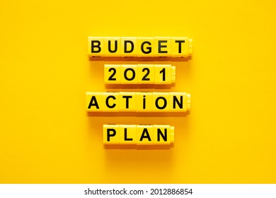 Lettering On Yellow Background: Budget 2021 Action Plan.