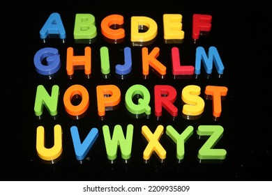 The English Alphabet letters. 26 letters in English. five are vowels  and 21 are consonants. colorful, a to z letters.  - Shutterstock ID 2209935809