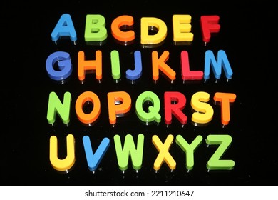 The English Alphabet letters. 26 letters in English. five are vowels  and 21 are consonants. colorful, a to z letters.  - Shutterstock ID 2211210647