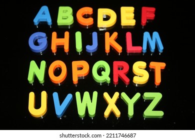 The English Alphabet letters. 26 letters in English. five are vowels  and 21 are consonants. colorful, a to z letters.  - Shutterstock ID 2211746687