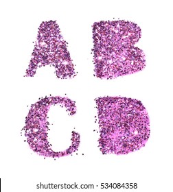 Letters A, B, C, D Of Purple Glitter Sparkle On White Background