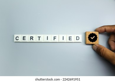 letters of the alphabet with the word CERTIFIED and its icon. Standard certification, accurate selection, production standards and good quality. - Shutterstock ID 2242691951