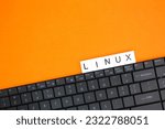 letters of the alphabet with the word linux. Internet concept. Linux is a family of open-source Unix-like operating systems based