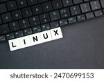 letters of the alphabet with the word linux. Internet concept. Linux is a family of open-source Unix-like operating systems based

