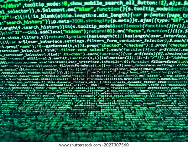 Letters, chars, and\
digits. Closeup of Web Code on Computer LED Screen. Web development\
code: CSSSASS styles preprocessor script lines. Coding programmer\
abstract background