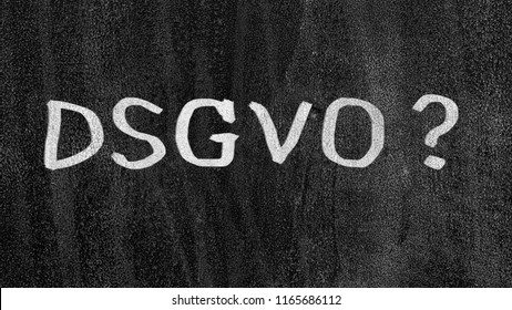 Letters "DSGVO" on a blackboard with chalk. Black chalkboard with the inscription DSGVO (Datenschutzgrundverordnung) in English GDPR (General Data Protection Regulation).
