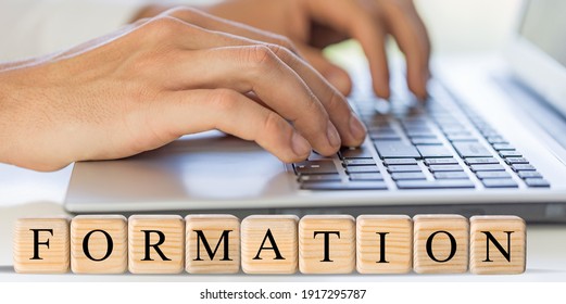 Letters on wooden cubes concept, business background with the word formation - Shutterstock ID 1917295787