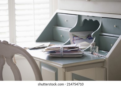 Letters Tied Up On Writing Desk At Home