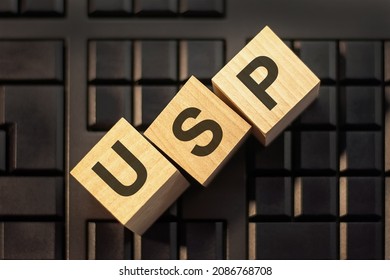 letters USP on 3d wooden cubes on a keyboard background, business concept. USP - short for Unique Selling Proposition - Shutterstock ID 2086768708