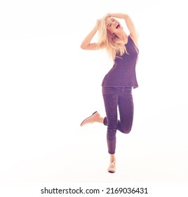 Letting Loose And Being Myself. Full Length Studio Shot Of A Lively Fashionable Young Woman.