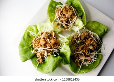 Lettuce Cups On A White Plate