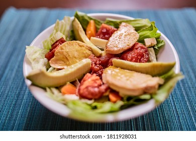 lettuce salad with chicken, tomato, cheese, avocado, carrot and honey mustard