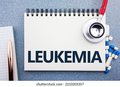 The LEUKEMIA Diagnosis Concept. Treatment Of Leukemia.The Word Leukemia On A Notepad On The Doctor's Desk, With A Stethoscope And Medications.