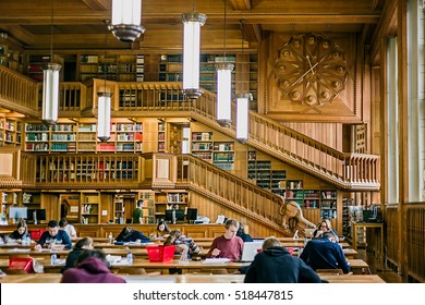 LEUVEN, BELGIUM - OCTOBER 14, 2015. Students Who Studying Inside The Library Of The University Of Leuven, Belgium, Old From The Years 1425.