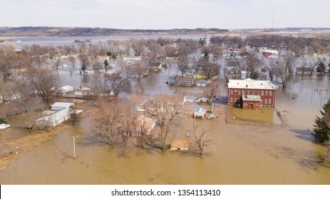 A Levee Breaks In The Midwest Flooding The Entire Town Of Pacific Junction And Its Residents