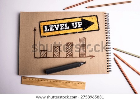 LEVEL UP text with hand drawn chart showing improvement growth and performance increase