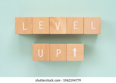 LEVEL UP; Eight wooden blocks with 