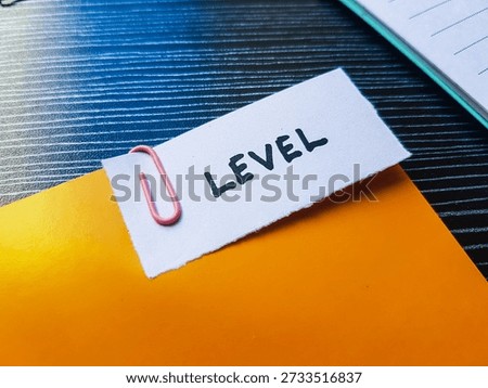 Level writting on table background. 
