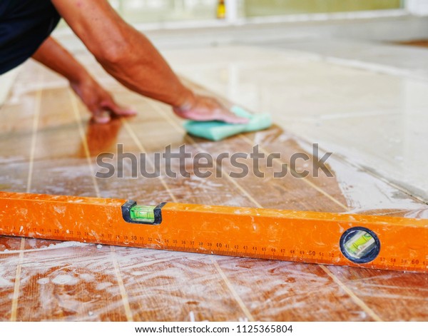 Leveling Tools On Dirty Floor Tiles Stock Photo Edit Now 1125365804