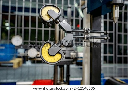 Lever type indicators for measuring and checking the runout and accuracy of CNC cutting tools.