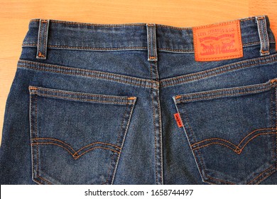 levi jeans with button back pockets