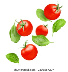 levitating cherry tomatoes and basil leaves on a white isolated background - Powered by Shutterstock